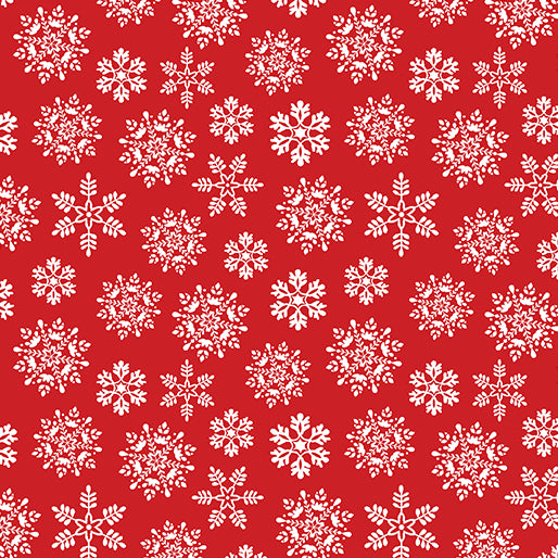 white snowflakes on red background