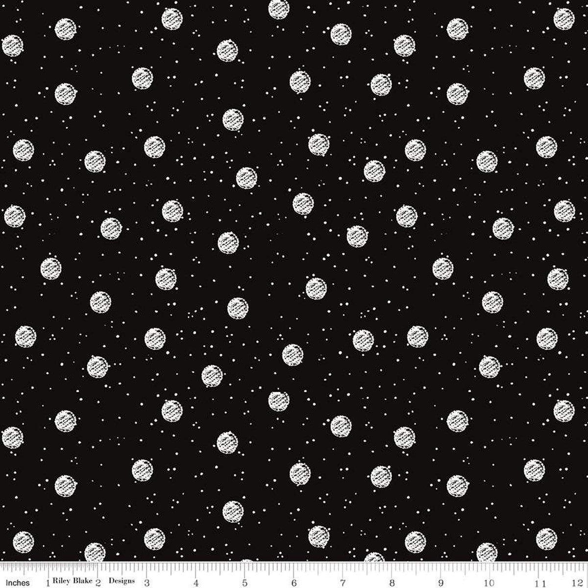 white snowballs on black background