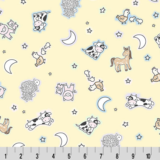 Children's fabric with animal and nature patterns on a yellow background