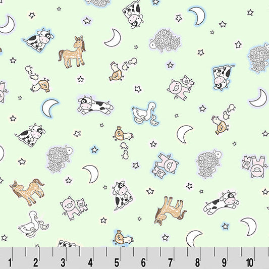 Children's fabric with animal patterns on a light green background